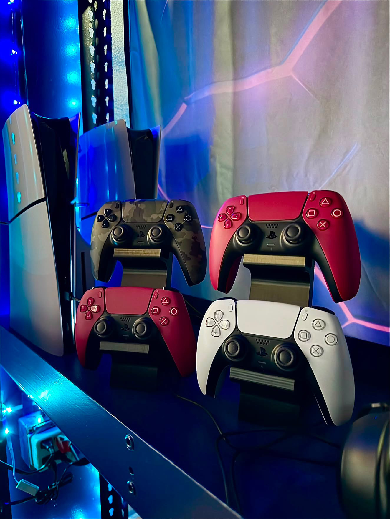 PlayStation 5 consoles and colorful controllers